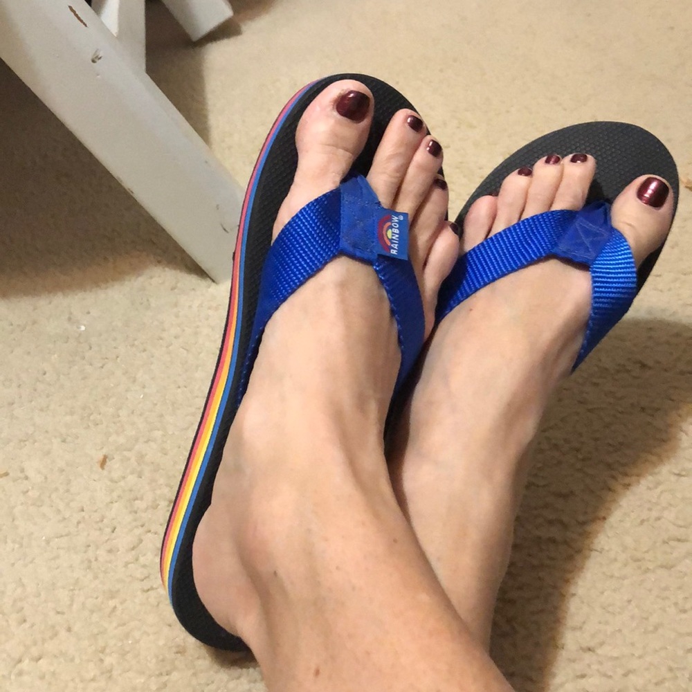 Stacked Rainbow flip flops